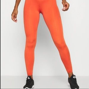 Orange Nike Leggings